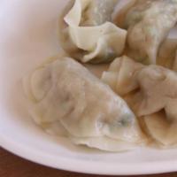 Boiled Pot Stickers (6 pieces) | 물만두 · Homemade poached pot stickers stuffed with shrimp and vegetables.