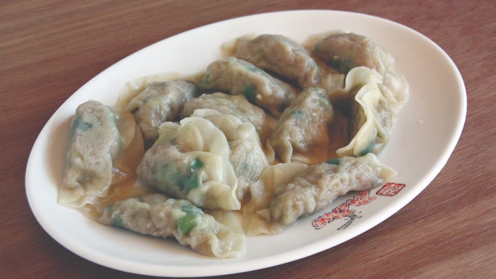 Boiled Shrimp Pot Stickers (10 pieces) | 새우물만두 · Homemade poached pot stickers stuffed with pork and vegetables.