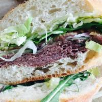 Roast Beef Sandwich · Includes horseradish spread, lettuce, tomatoes, pickles, onions, mayo, and dijon mustard, wi...
