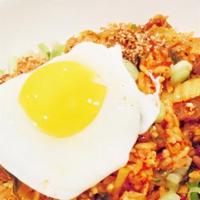 Kimchi Fried Rice · With fried egg and scallions.