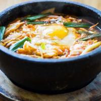 Spicy Kelp Ramen · Curly flour noodles with vegetables, egg, and scallions.