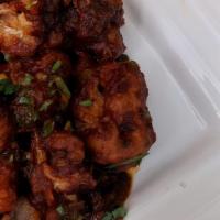 Gobi Manchurian · Gobi mean cauliflower and this is deep fried then mixed with manchurian sauce which is a com...