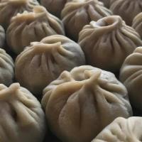 Lamb Momo · Eight homemade and wrapped Nepalese potstickers, filled with lamb, and seasoned with importe...