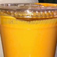 Mango Lassi · Cold drink with mango pulp mixed with yogurt.