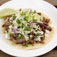 Sisig Tacos · Your choice of Vegan pork, chicken, tocino, or longanisa-chorizo. 6