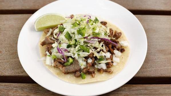 Sisig Taco · Your choice of Pork, Chicken or Tofu on one 6