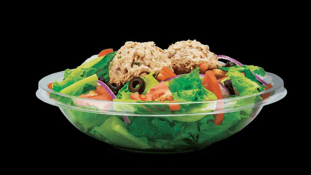 Tuna Salad · Albacore tuna salad served on a bed of fresh lettuce, with your choice of dressing. Add your choice of toppings - sliced tomato, purple onion, olives, pickles, pepperoncinis and our signature shakers.