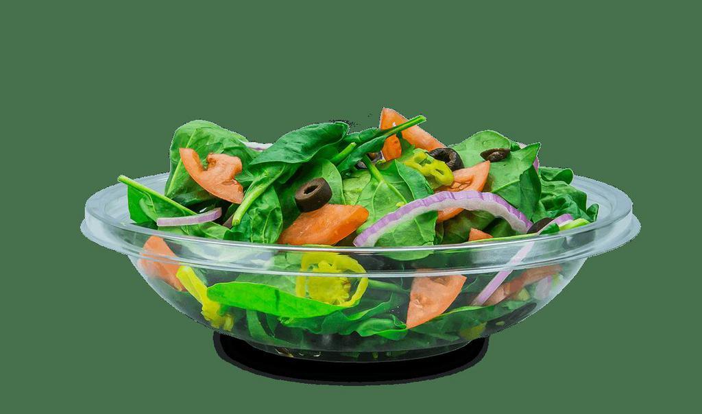 Spinach Salad · Fresh spinach served in a bowl, with your choice of dressing. Add your choice of toppings - sliced tomato, purple onion, olives, pickles, pepperoncinis and our signature shakers