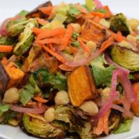 Heart of the Town Salad · Sweet potatoes, chickpeas, Brussels sprouts, carrots, and pickled onions on romaine lettuce ...
