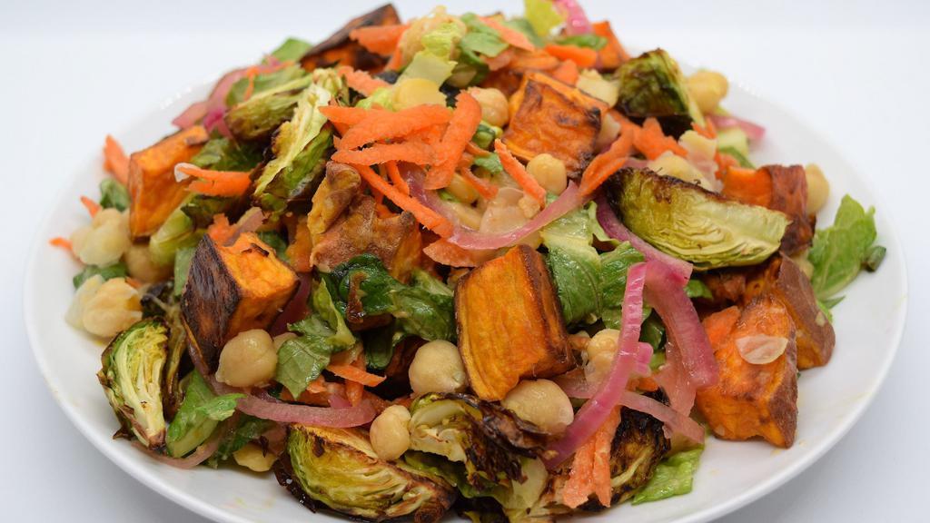 Heart of the Town Salad · Sweet potatoes, chickpeas, Brussels sprouts, carrots, and pickled onions on romaine lettuce with a honey mustard dressing.