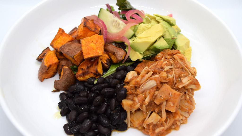 BBQ Jackfruit Bowl · BBQ jackfruit, sweet potatoes, avocado, mixed greens, cucumbers, pickled onions, and black beans with BBQ sauce.