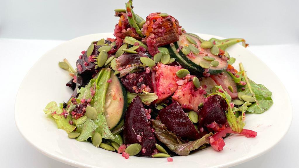 Feel the Beet Bowl · Beets, apples, sweet potatoes, pepitas mixed greens, and spiced quinoa with a lime cilantro dressing.