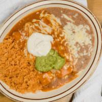 Enchiladas Suizas · 2 corn or flour tortillas filled with you choice of Chicken, Ground beef, Shredded Beef or C...