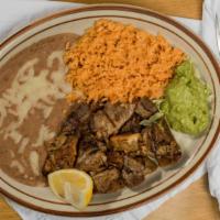 Carnitas Plate · Pieces of pork. Served with rice, beans, guacamole, and tortillas.