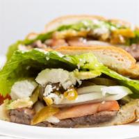 Torta Regular / Regular Mexican Sandwich · Su elección de carne, lechuga, tomate, cebolla, jalapeño y queso fresco, mayo. / Your choice...