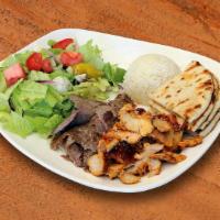 Combo Gyros Plate · Slow cooked, thinly sliced, marinated chicken, lamb, and beef.
