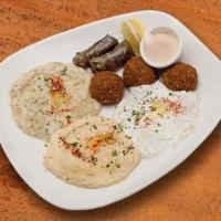Veggie Combo Plate · (Vegetarian) Comes with hummus, baba ghanoush, falafel, dolma, and salad.