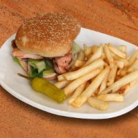 Salmon Burger · Salmon pounder burger, served with fries and salad.