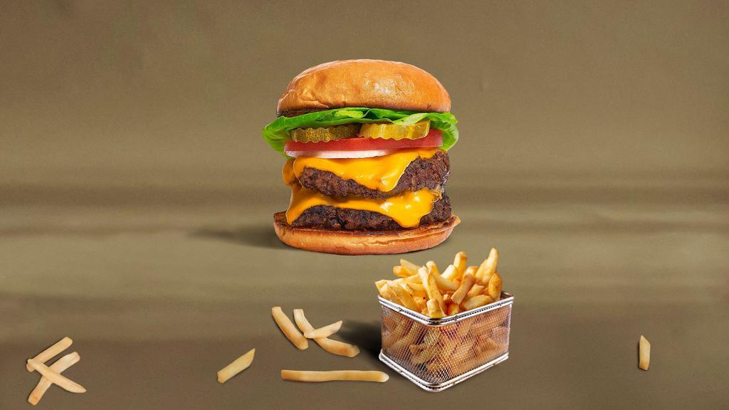 Double Cheese Trouble Burger · Mouthwatering juicy double cheeseburger with two 1/3 lb. beef patties, mild cheddar cheese, tomatoes, onions, lettuce and our house sauce.