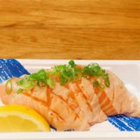 Seared sake toro sashimi  · 3 pieces of torch salmon belly.