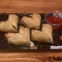 Egg Rolls (4 Pieces) · Deep fried veggie spring rolls with sweet and sour sauce.