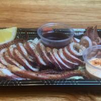 Ikayaki · Grilled whole squid with side spicy mayo and side wasabi sauce.