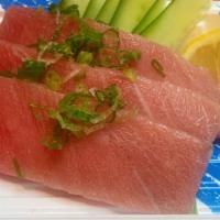 Chu toro sashimi · 3 pieces of medium fatty tuna.