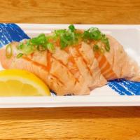 seared sake toro sashimi · 3 pieces of torch salmon belly.