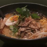 Tan Tan Ramen · Spicy. Spicy minced pork, chashu, egg, bean sprout, corn, and cilantro in spicy miso broth.