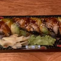 Dragon Roll · Shrimp tempura, cucumber, and crab meat topped with eel and avocado.