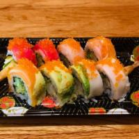 Shrimp Tempura Rainbow Roll · Shrimp tempura, avocado, and cucumber topped with assorted fish and tobiko.