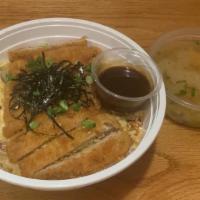Tonkatsu Don · Deep fried pork cutlet with sear egg, sweet onion, and nori flakes. Served side of katsu sau...