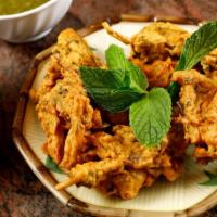 3. Mix Vege Pakora · Potatoes, onion, and spinach coated in chickpeas batter and fried.