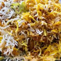 19. Prawn Biryani · Basmati fried rice with prawns, herbs, and spices.