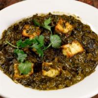 28. Palak Panner · Spinach with homemade cheese, herbs, and spices.