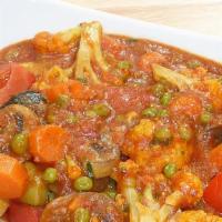 20. Mixed Vegetable Masala · Cauliflower, potatoes, green beans, peas, carrot in curry sauce.