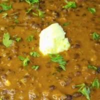 23. Daal Makhani · Black lentils in creamy sauce, herbs, and spices.