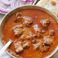 48. Lamb Curry · Lamb with ginger, garlic, and special blend of spices.