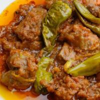 54. Achar Gosht · Lamb cooked with pickled spices and herbs.