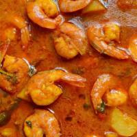 58. Prawn Curry · Prawns with ginger, garlic, and special blend of spice.