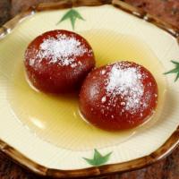 80. Gulab Jamun · Dumplings of flour, dried milk in cardamom, flavored syrup.