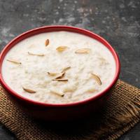 79. Almond Kheer (Rice Pudding) · Rice pudding with almonds and cardamon.