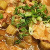 Uncle Paulie's Gumbo · A Generous Serving of H10 House-made roux with chicken, sausages, fish, celery, okra, and di...