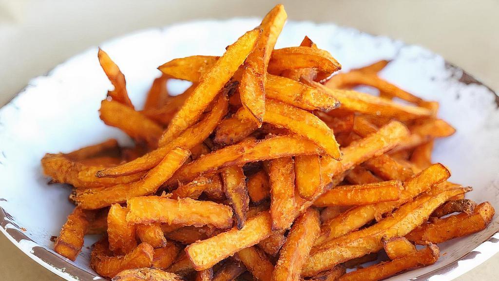 Sweet Potato Fries · A Serving of Delicious Sweet Potato Fries. 
Add Our Delicious House-made Aioli Sauce to dip with it!