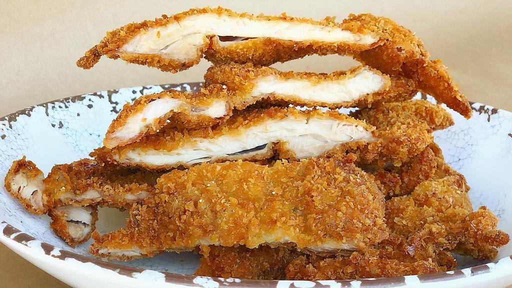 Chicken Katsu Basket · Fried Chicken Katsu Strips with Cajun Fries.