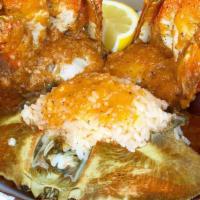 Dungeness Crab · A House favorite. Our Famous sauced rice stuffed back with all the goodness in the shell! Pr...