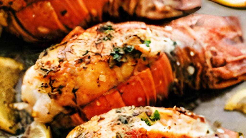 Linda's Special · Each Order Comes with 2 Delicious Lobster Tails in theFlavor and Spice of Your Choosing. Comes with 1 corn, 1 potato and your choice of 1 white rice or 1 parathe bread.

Add Corn, Potato, and Sausage to Your Delicious Seafood bag! More can be added in 