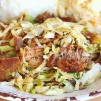 Kalua Pork · Our Hawaiian-style smoked pulled pork with shredded cabbage. Super flavorful!