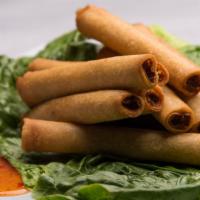 Lumpias (10pc) · A Serving of Our Delicious Fried Pork Lumpias. 
(10 Rolls per order) Paired with a delicious...