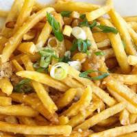 Garlic Fries · A Serving of Fries hand-tossed in Our House-made savory fresh garlic sauce and garnished wit...